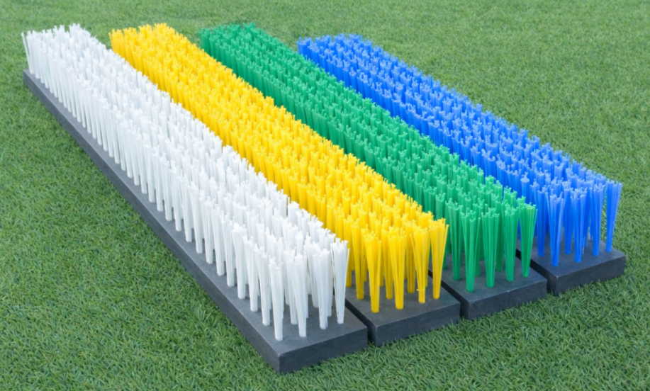 reserve borstels driehoeksbezem in wit, geel, groen en blauw